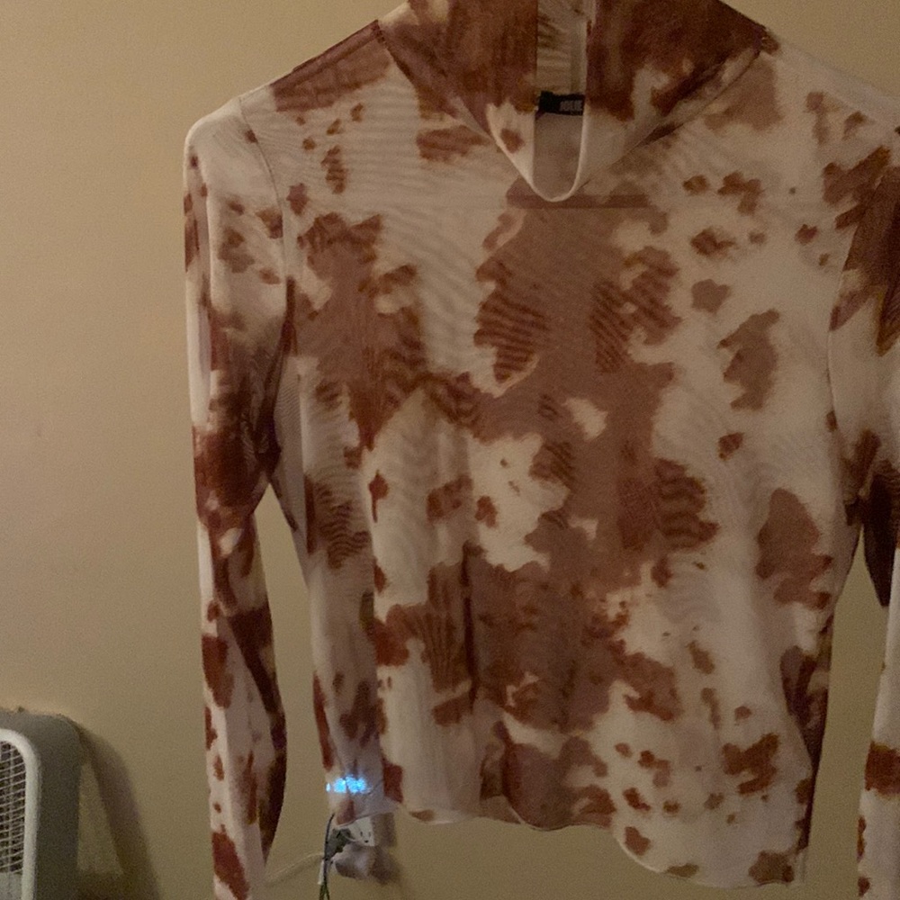 A Jolie & Joy sheer cow print shirt